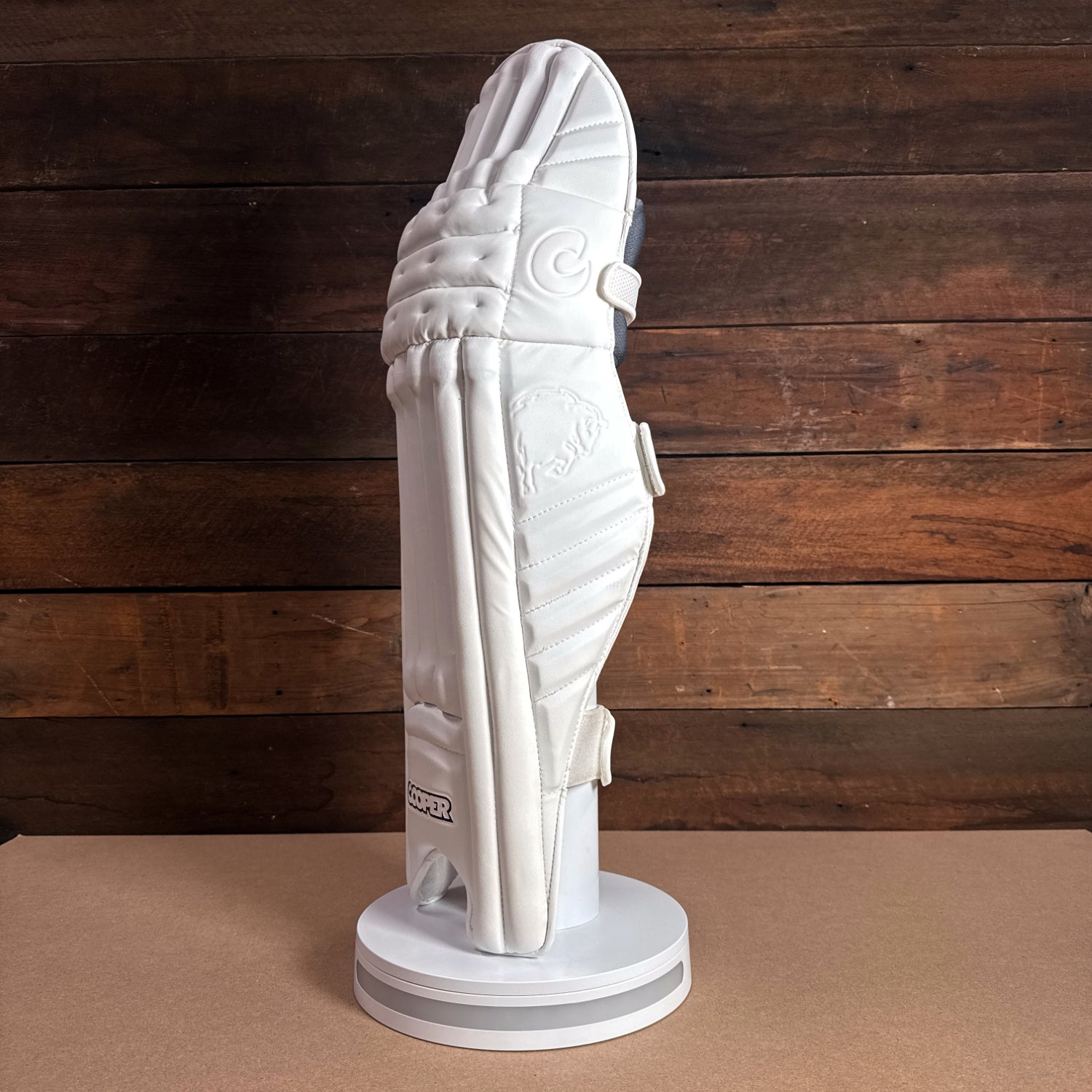 Bison Cricket Pads 2024-25 youth edition, showcasing premium protection and sleek design for young players.