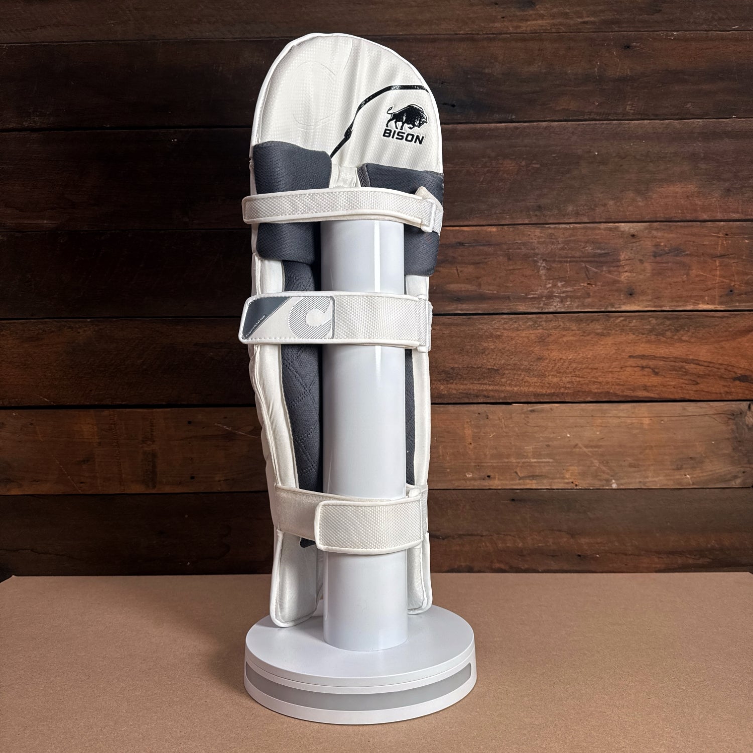 Bison Cricket Pads 2024-25 for youth, showcasing premium protection and modern design on display.