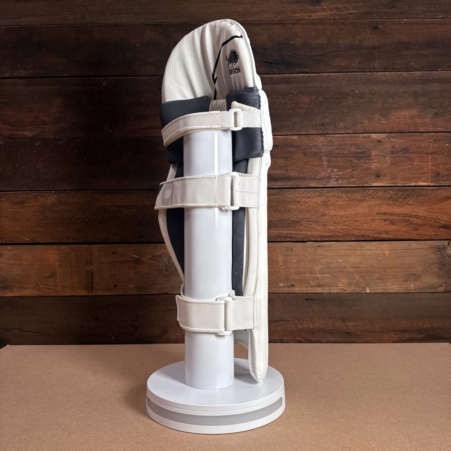 Bison Cricket Pads 2024-25 for youth, showcasing premium protection and modern design on display.