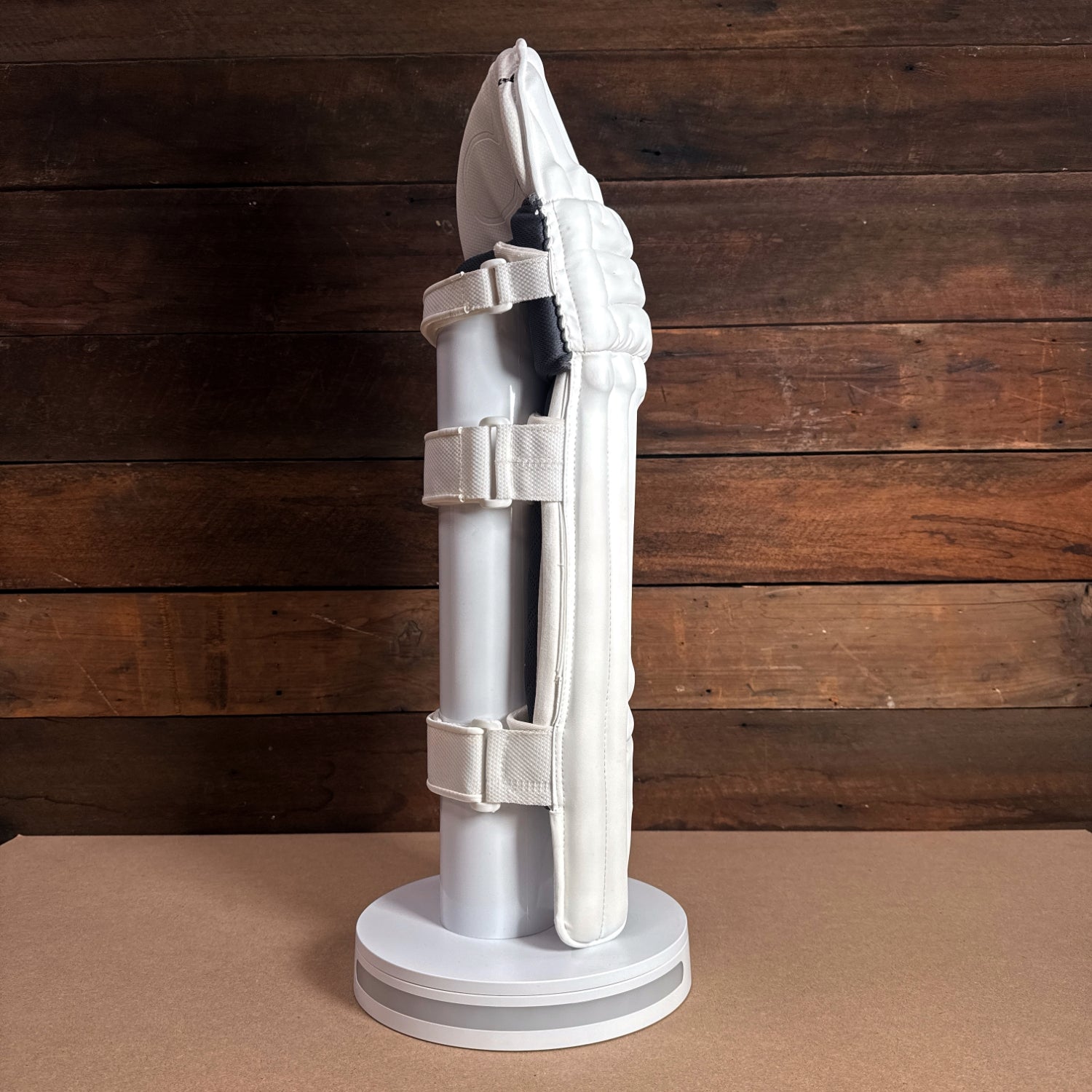 Bison cricket pads for youth, showcasing premium protection and modern design on display.