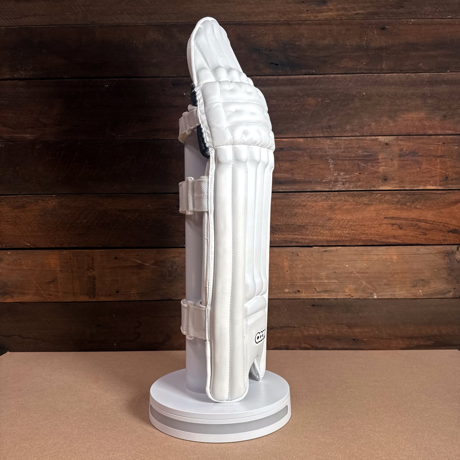 BISON PADS 2024-25 Youth cricket pads showcasing premium protection and modern design on display.