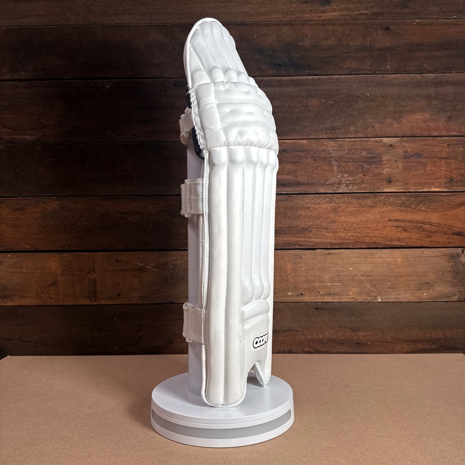 Bison Pads 2024-25 youth cricket pads with premium foam protection, showcasing a sleek design and snug fit.