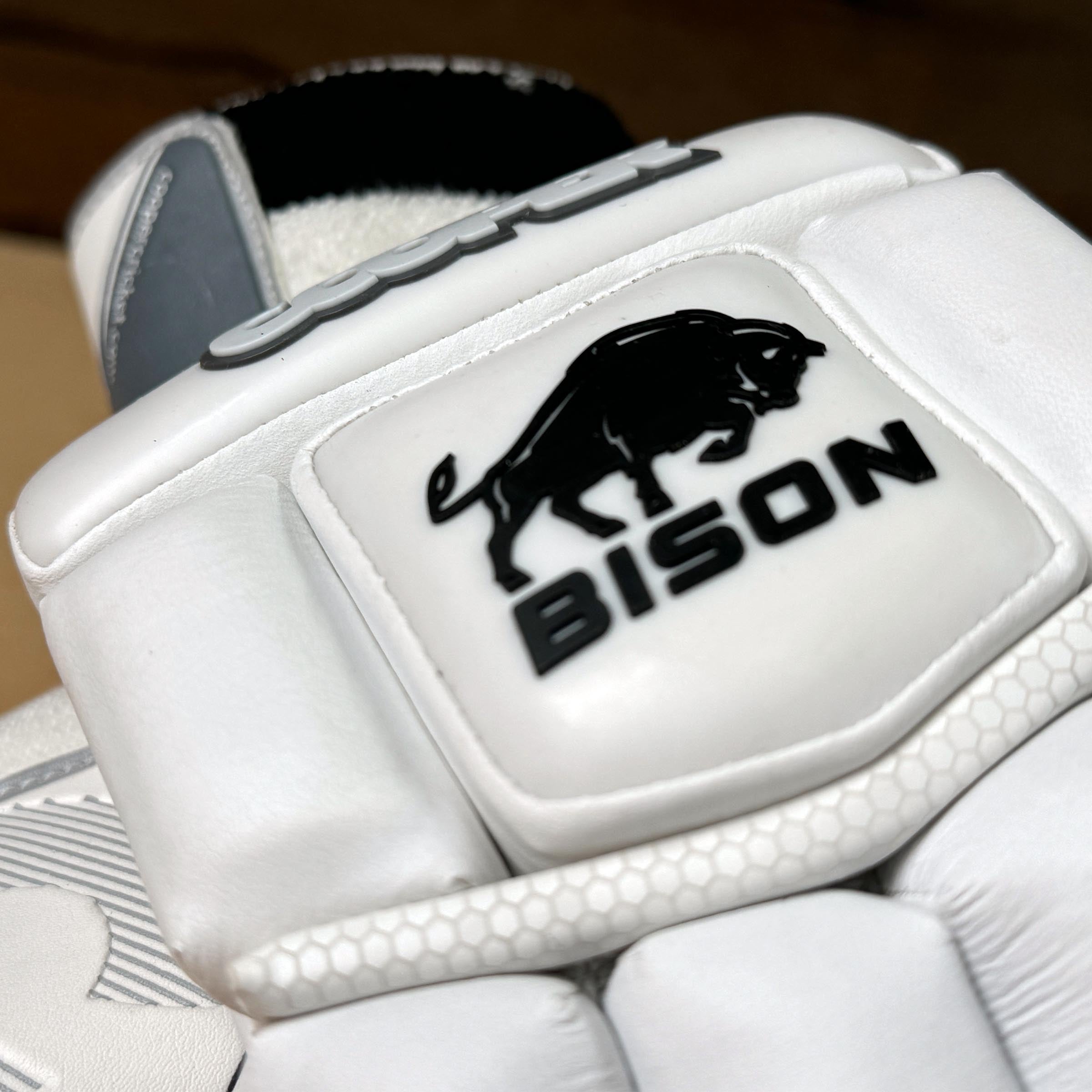 Close-up of BISON Gloves 2024/25 showing logo and premium craftsmanship for cricket, featuring stylish design and durable materials.
