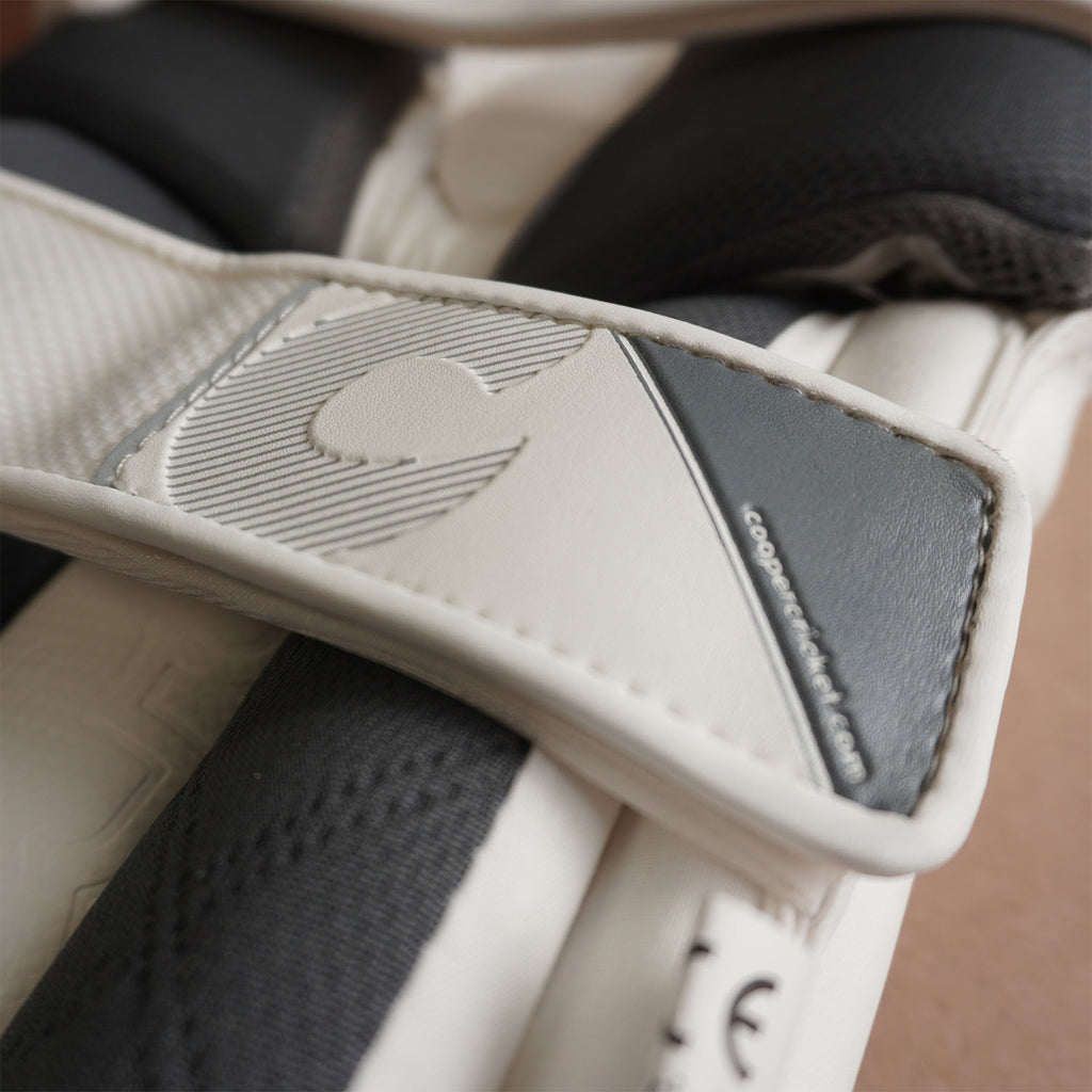 Close-up of Bison cricket pads showcasing premium foam and sleek design features.
