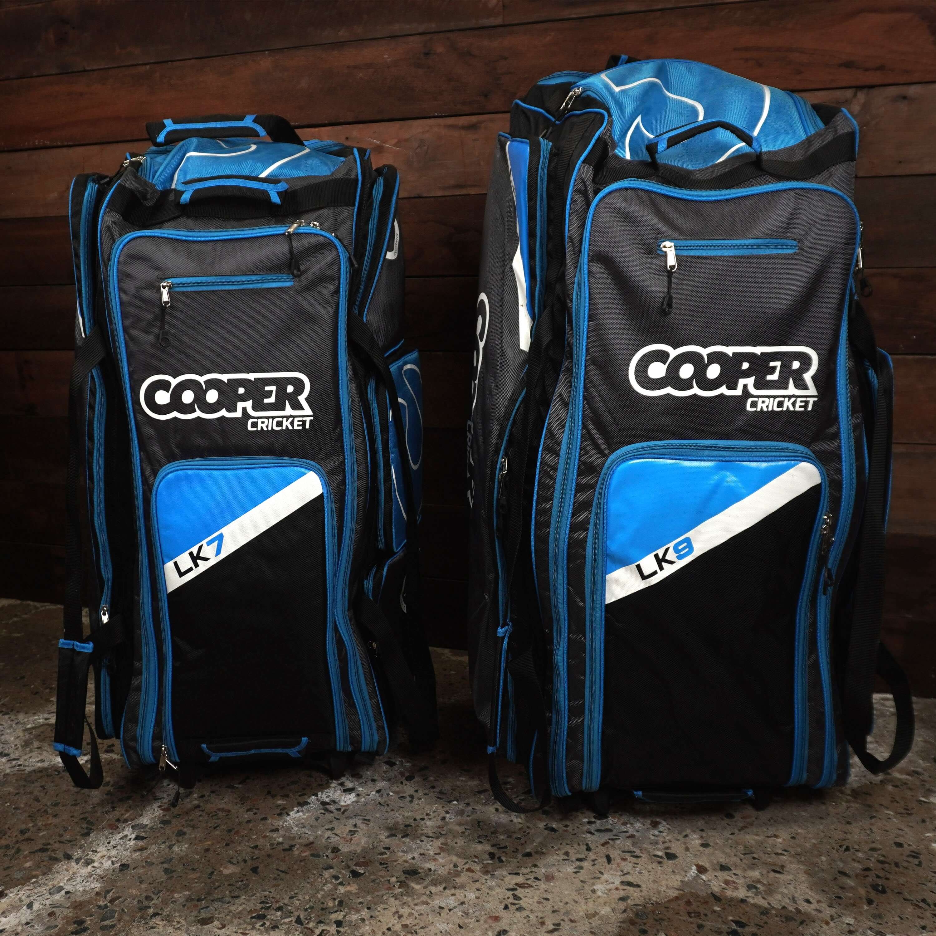 Blue and black LK7 and LK9 cricket bags with multiple compartments and durable design.