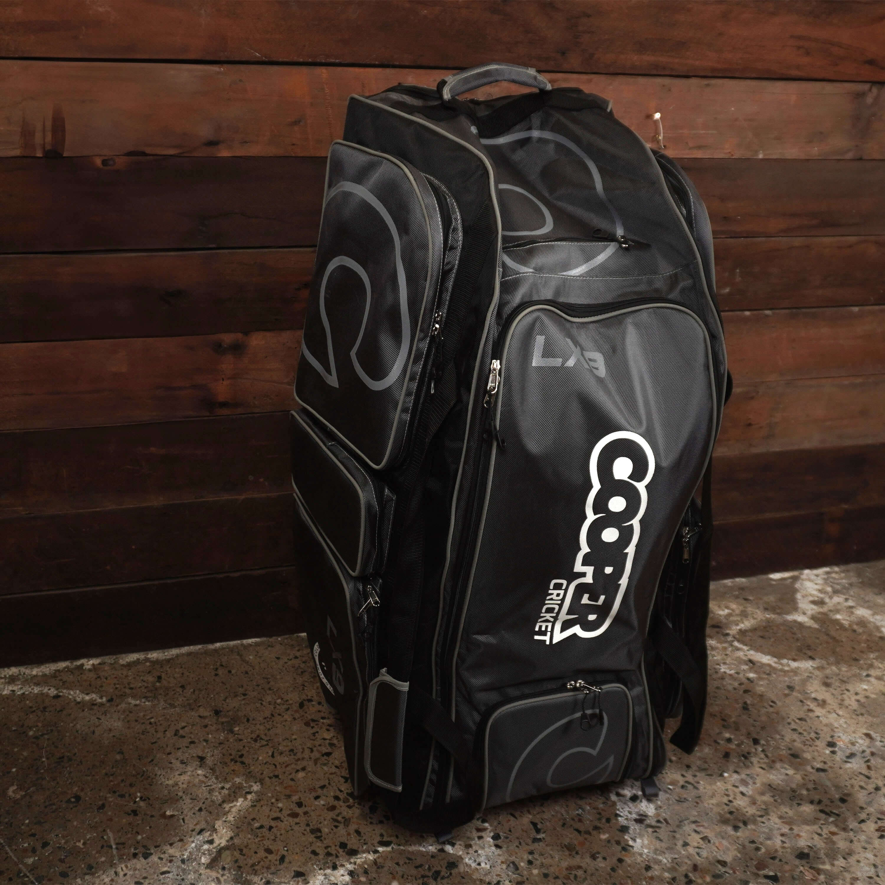 LX9 Cricket Bag with spacious design, cold section, and pull-out handle for convenient cricket kit transport.