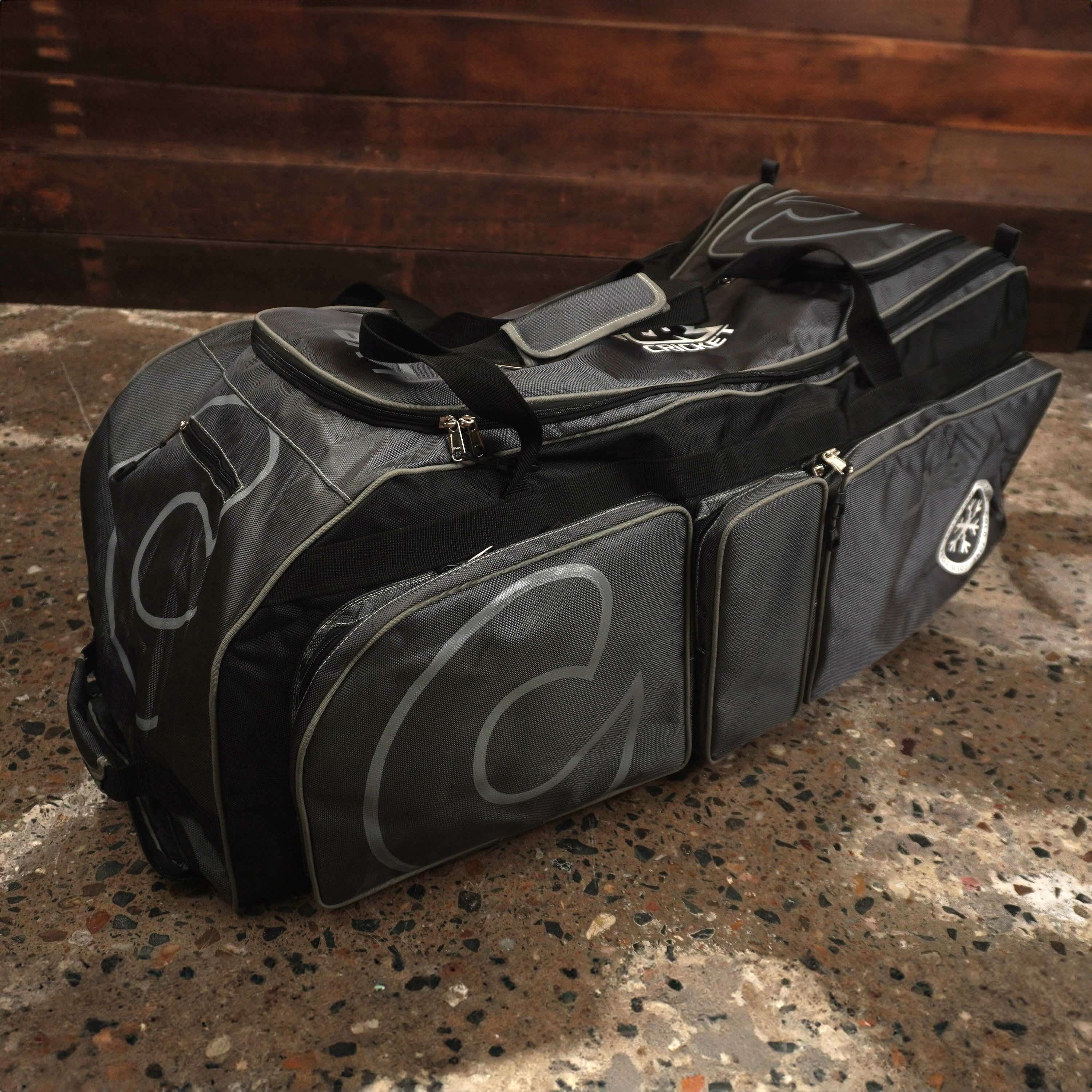 LX9 cricket bag with spacious compartments, pull-out handle, and cold section for drinks, perfect for carrying complete cricket kit.