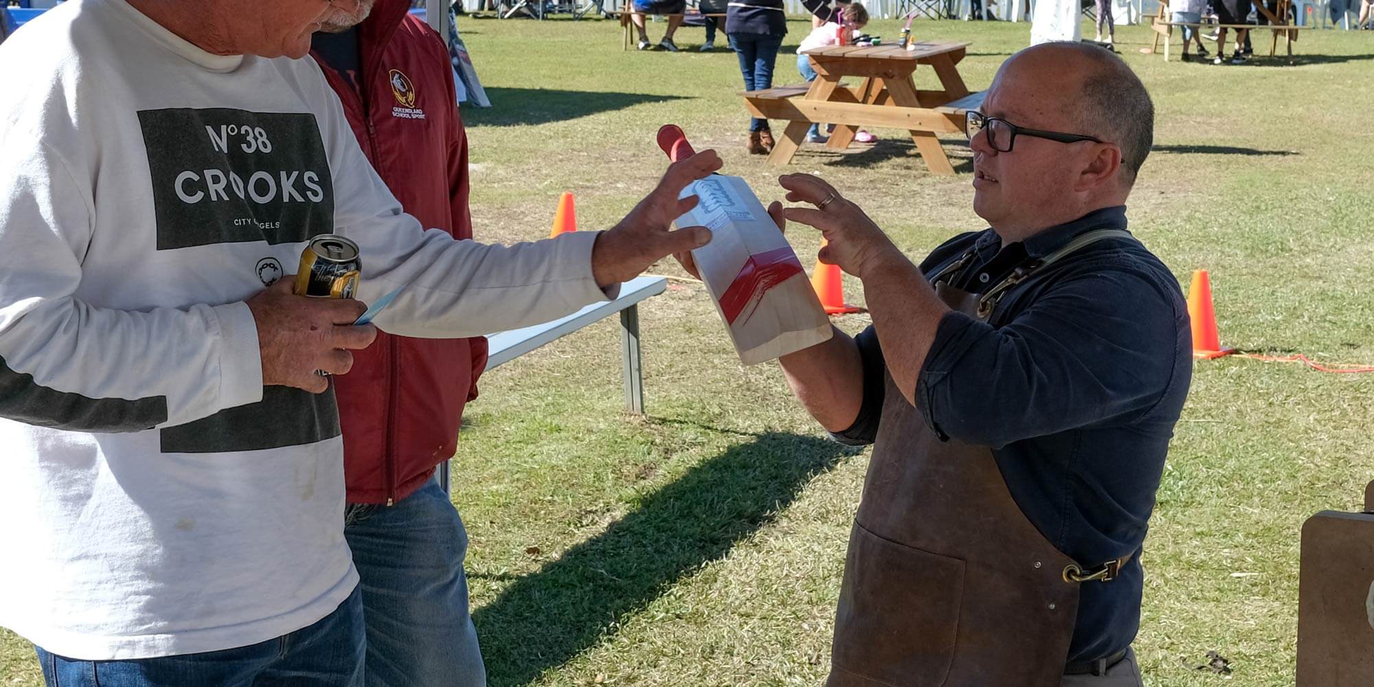 Rod Grey from Cooper Cricket talking to people about bat shapes