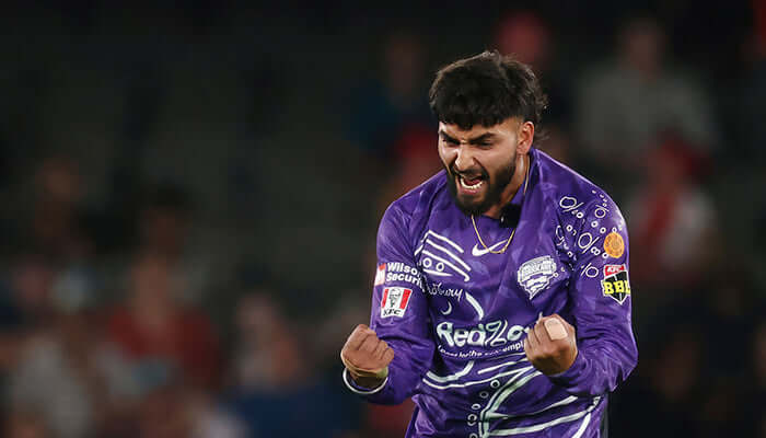 Nikhil Chaudhary from Cooper Cricket celebrates a wicket