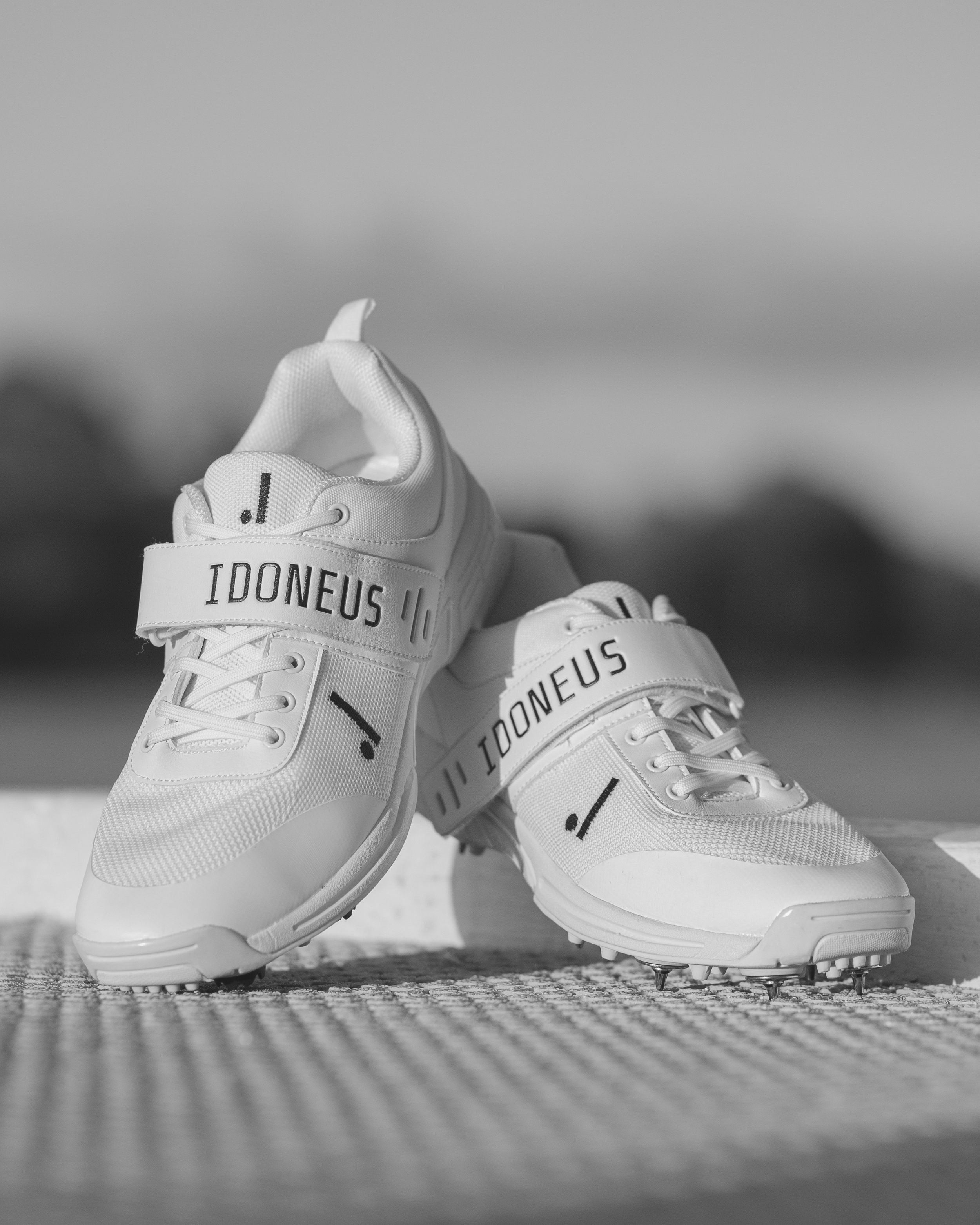 Idoneus ID1 cricket shoes with steel spikes for enhanced grip and stability on field, designed for players of all levels.