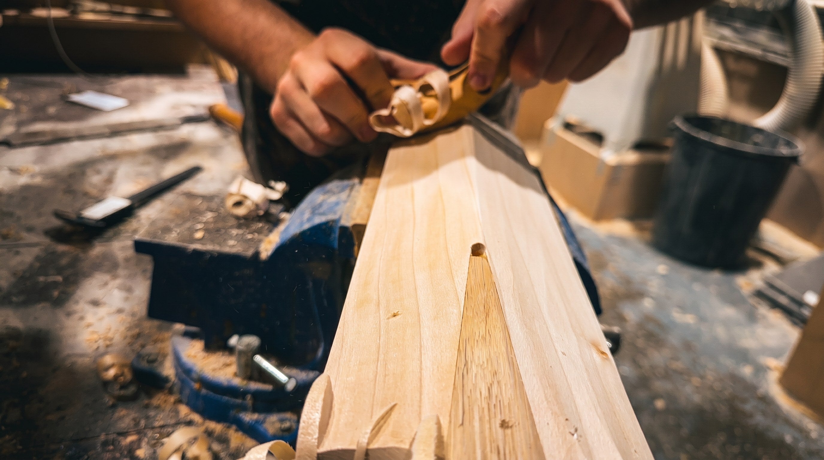 Shaping a Cooper bat by hand with a spokeshave