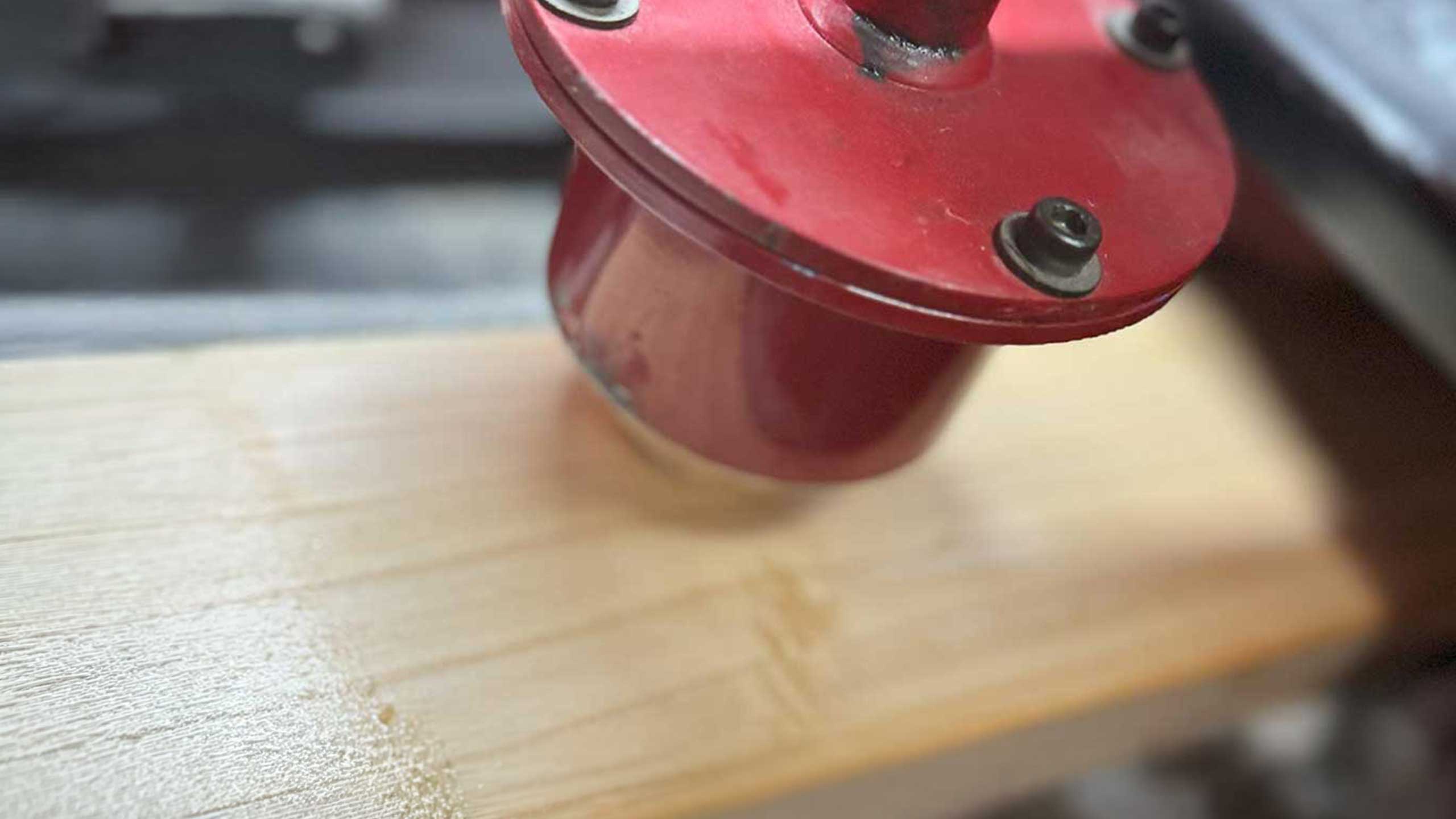 Knock-in machine working a cricket bat blade in the Cooper workshop